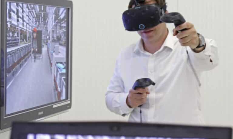 Man wearing virtual reality headset and controllers, experiencing immersive virtual shopping environment