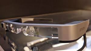 Closeup of an Epson smart glasses device with sleek, metallic frame
