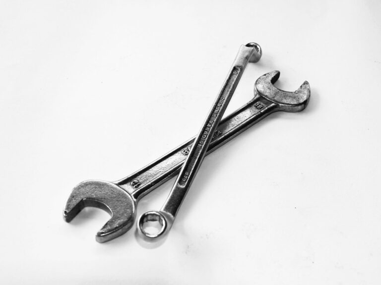 Two silver wrenches on a white background