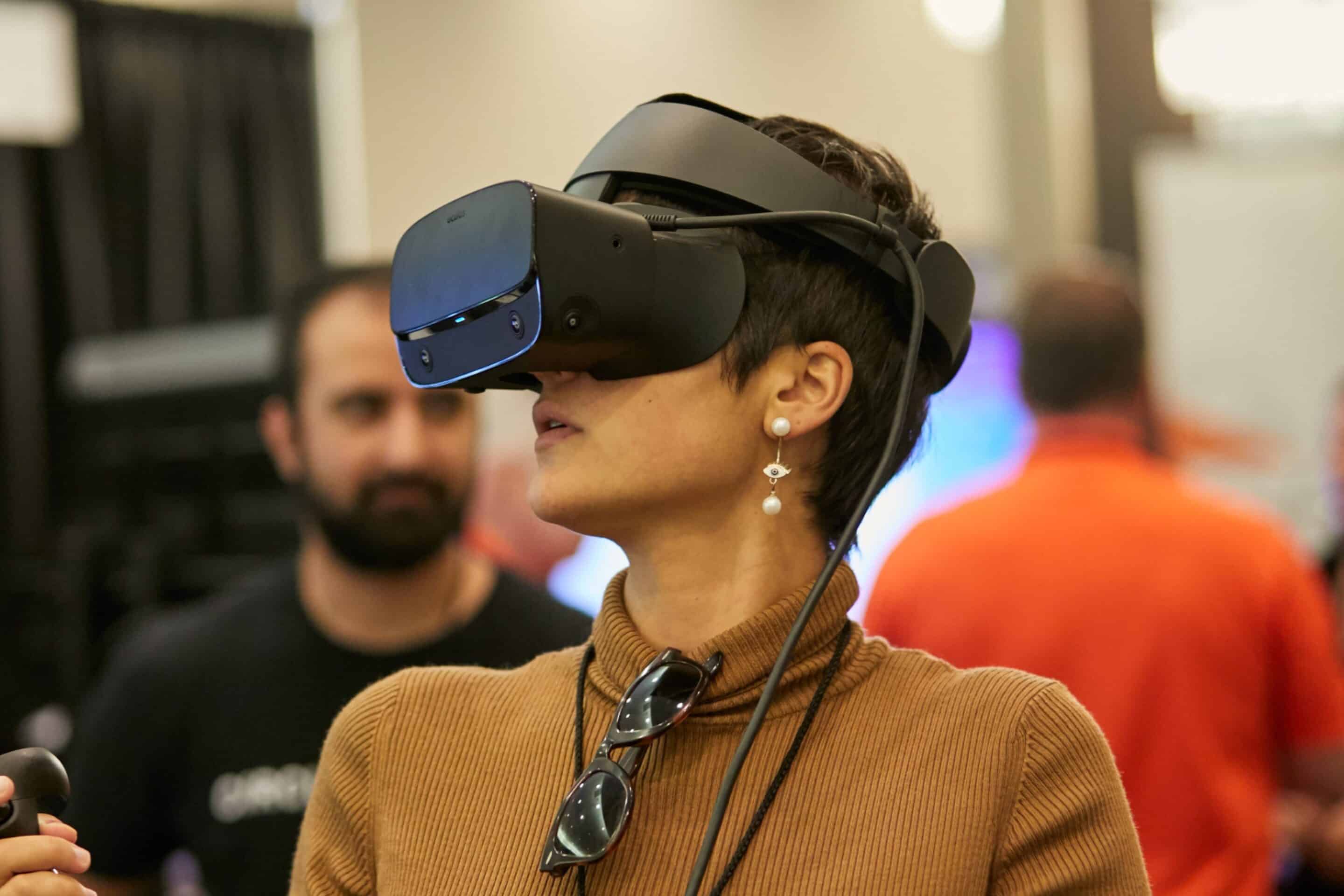 A person wearing a virtual reality headset, immersed in a digital experience.
