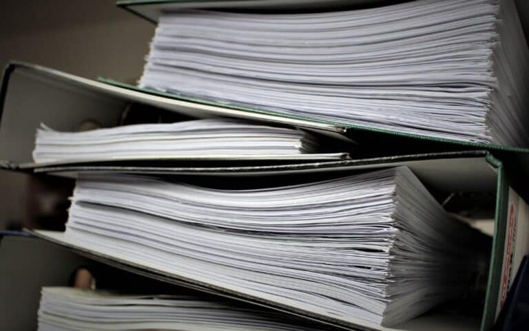 Stacks of paperwork and documents in office files