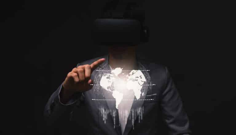 Businessman wearing virtual reality headset with a world map projection, representing global technology and connectivity