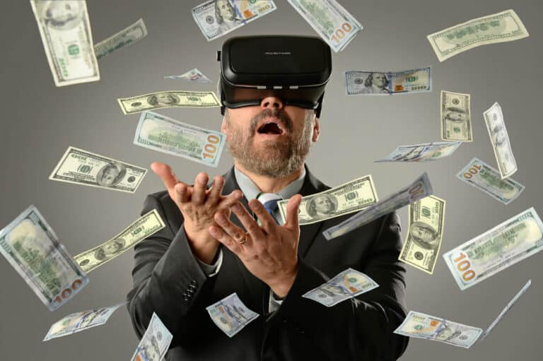 A man wearing a virtual reality headset surrounded by U.S. dollar bills, conveying the concept of making money or wealth in the digital economy