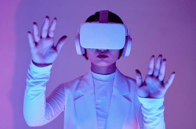 Person wearing virtual reality headset in futuristic lighting