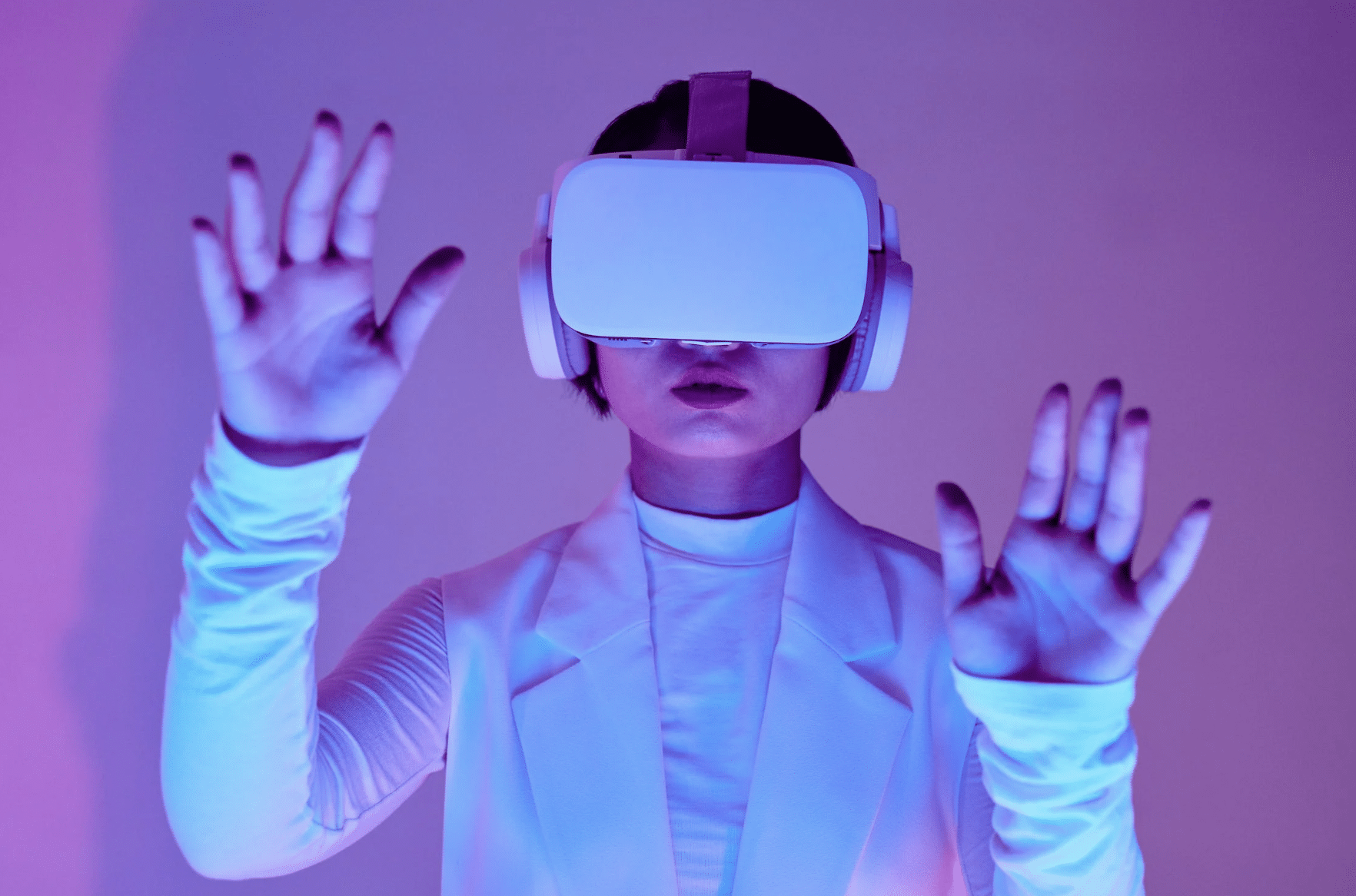 Person wearing virtual reality headset in futuristic lighting