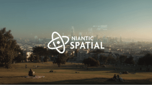 A skyline of a large city with tall buildings and skyscrapers in the background, with the Niantic Spatial logo in the foreground.